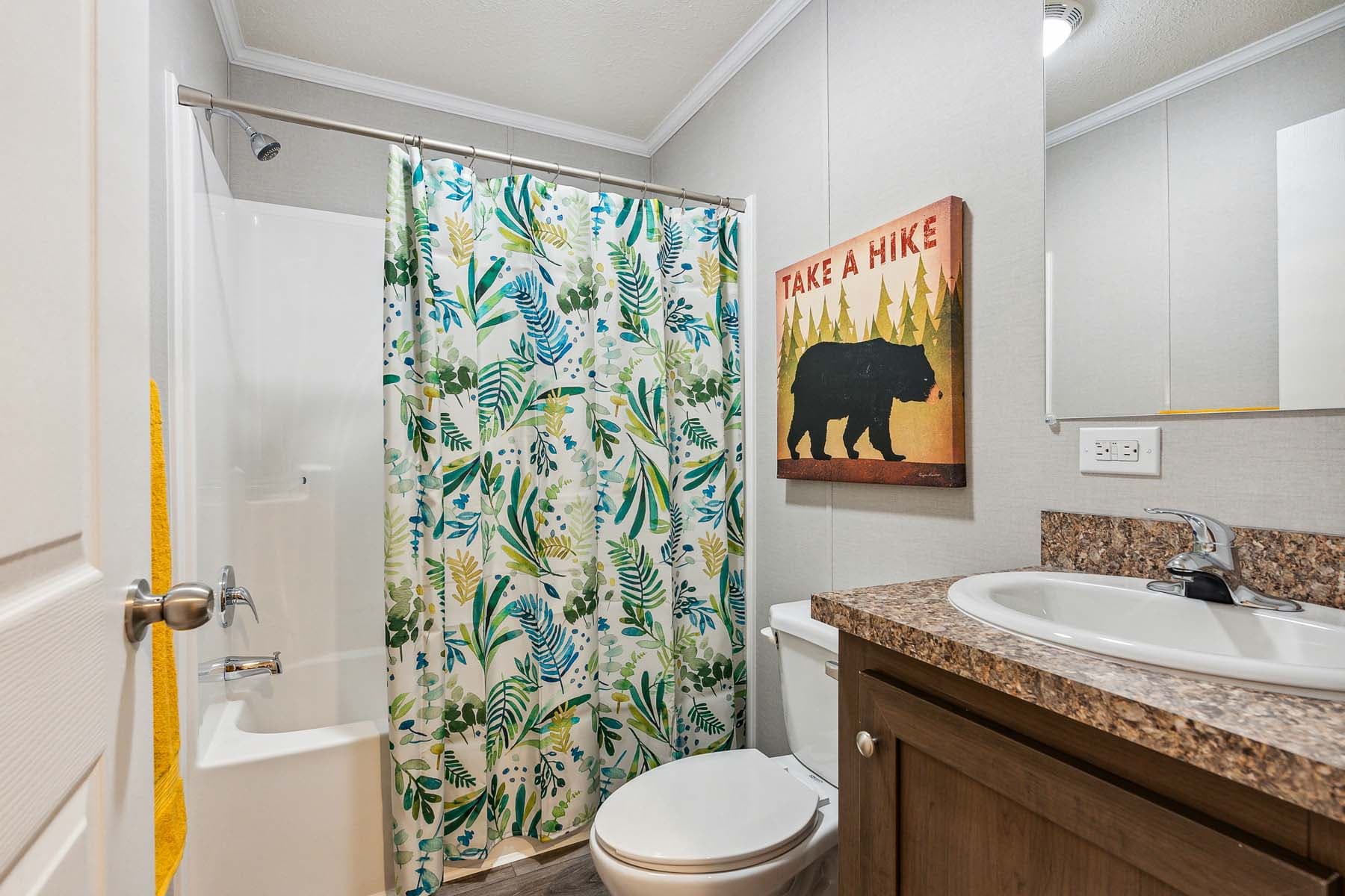 Click to enlarge 1672H32087 single wide home — bathroom (photo 7 of 16)