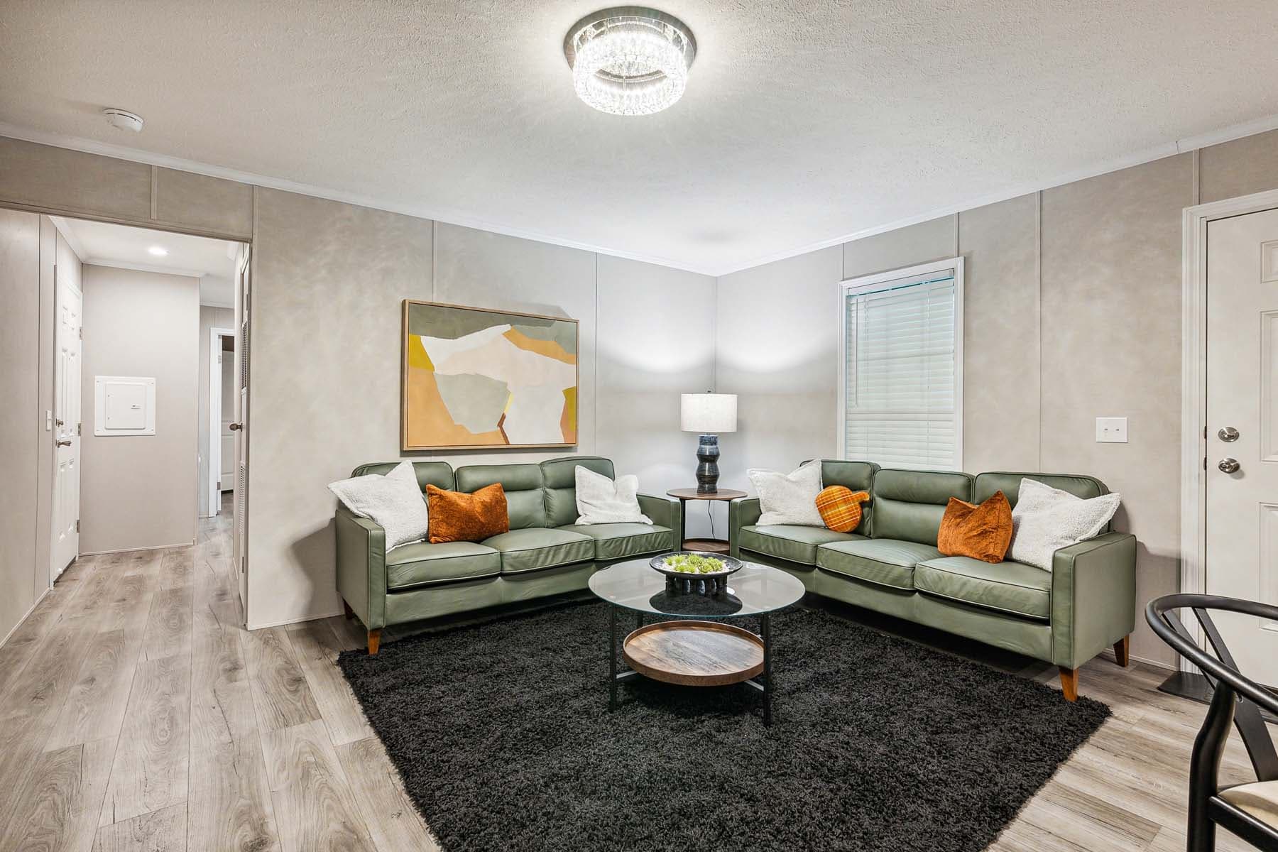 Click to enlarge 1672H32087 single wide home — living room (photo 11 of 16)