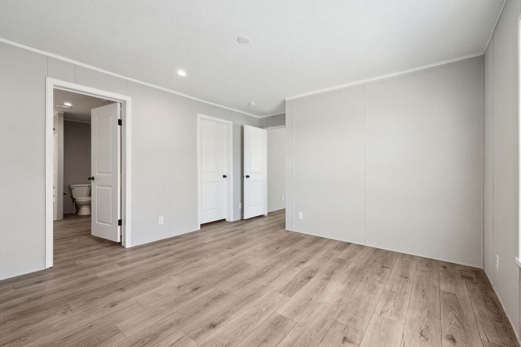 Click to enlarge Woodward multi-section home — primary bedroom (photo 13 of 13)