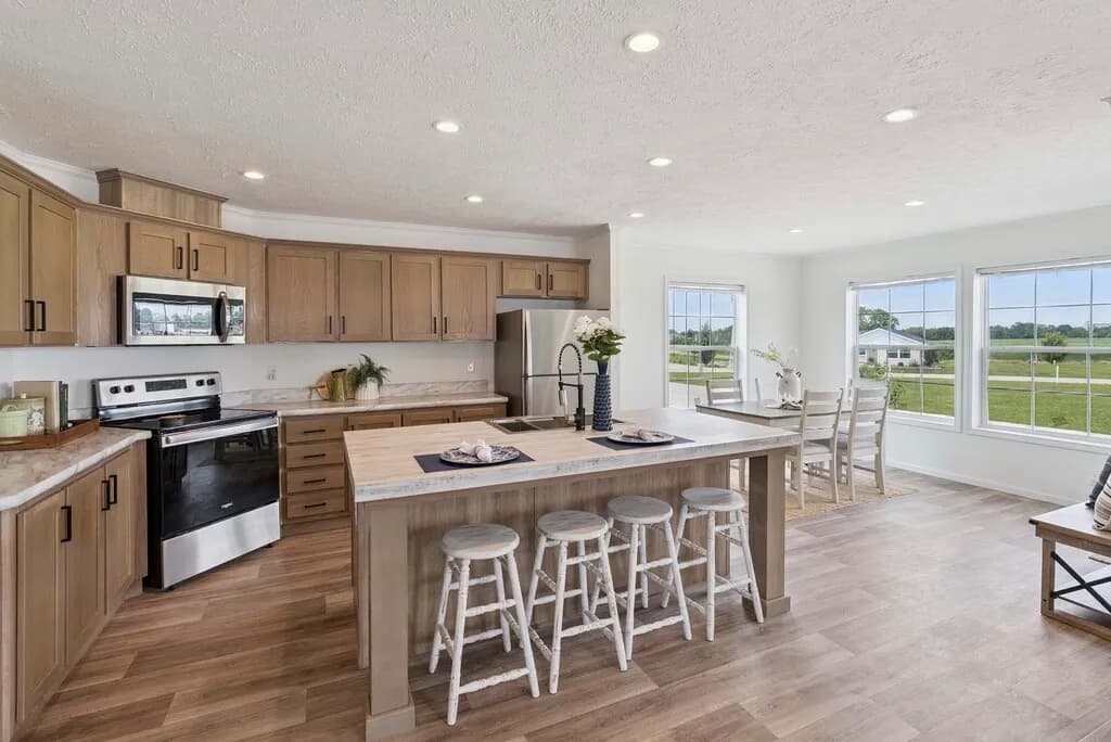 Click to enlarge Bay Port multi-section home — kitchen (photo 4 of 10)