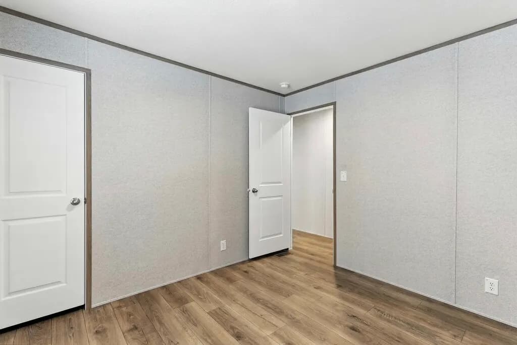 Click to enlarge Monte single wide home — bedroom (photo 8 of 37)