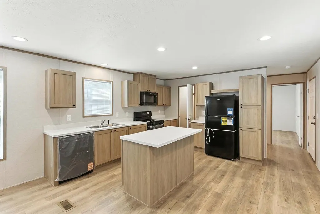 Click to enlarge Monte single wide home — kitchen (photo 4 of 37)