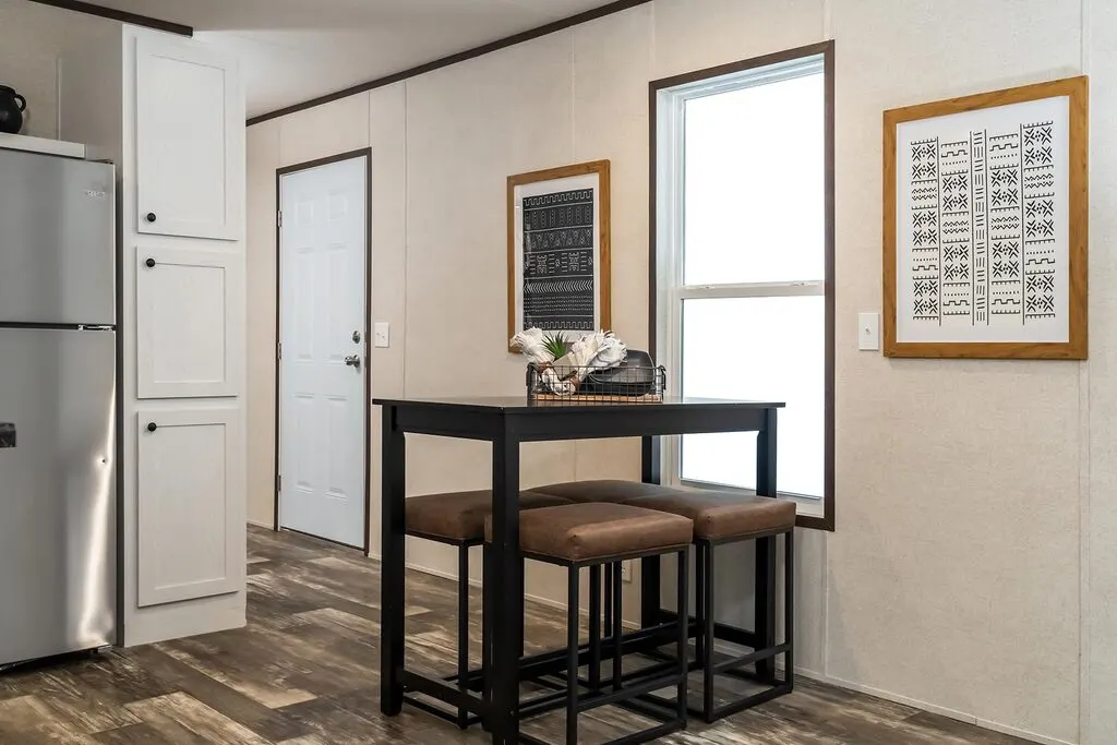 Click to enlarge Ridge single wide home — dining area (photo 5 of 8)