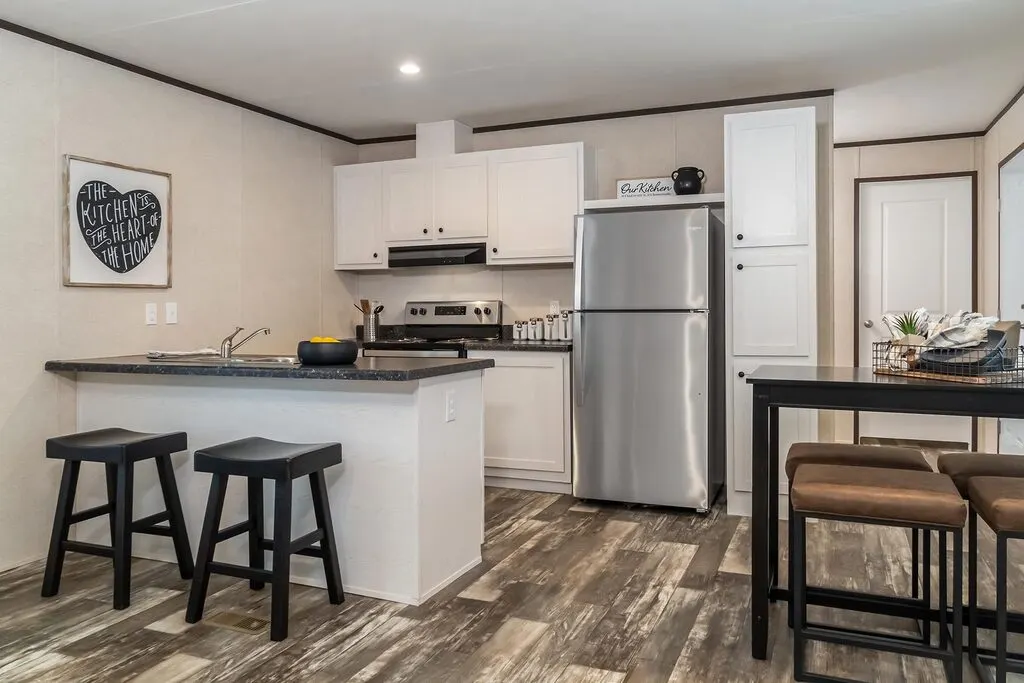 Click to enlarge Ridge single wide home — kitchen (photo 3 of 8)