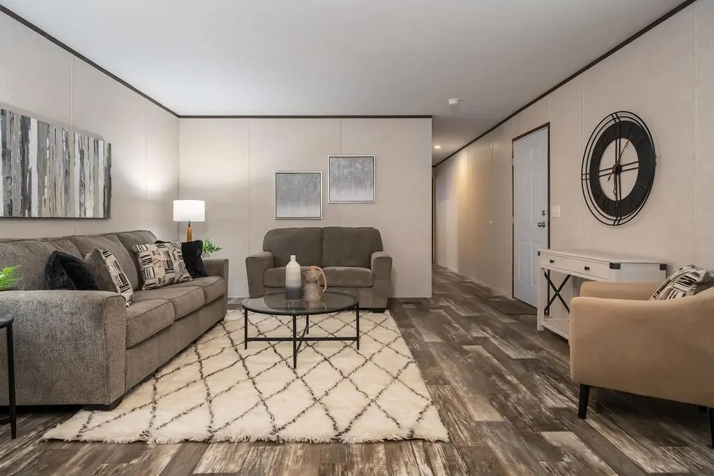 Click to enlarge Ridge Reverse Aisle single wide home — living room (photo 2 of 7)