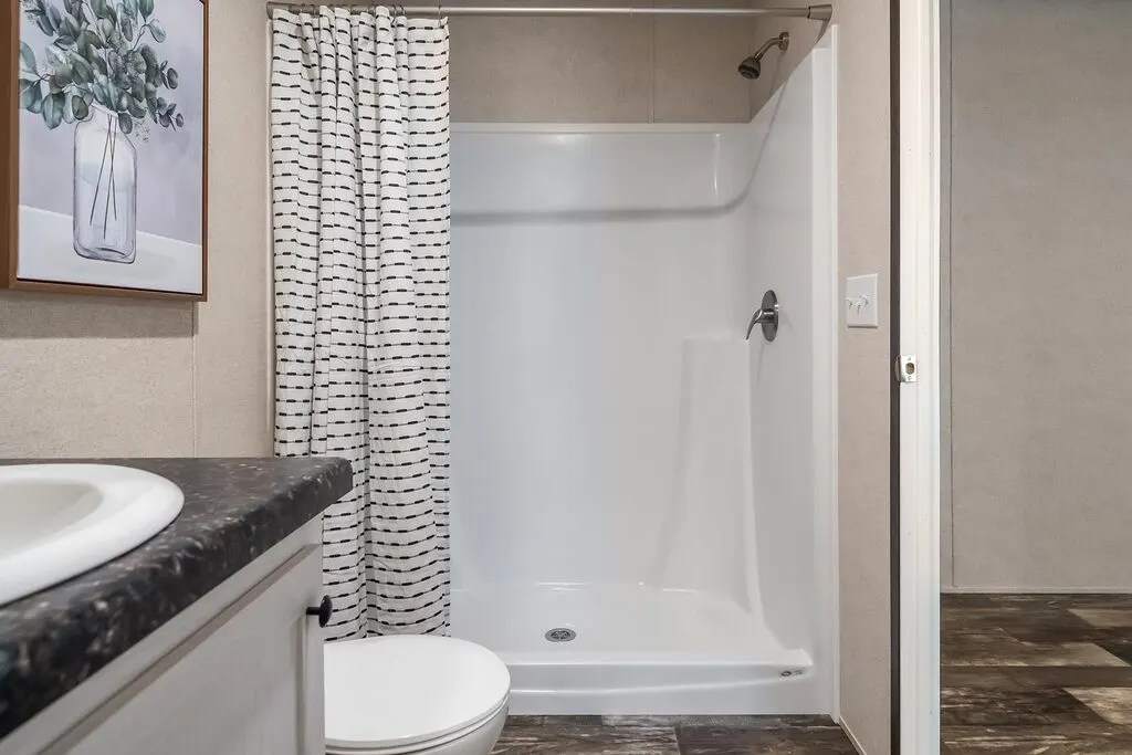 Click to enlarge Ridge Reverse Aisle single wide home — primary bathroom (photo 7 of 7)