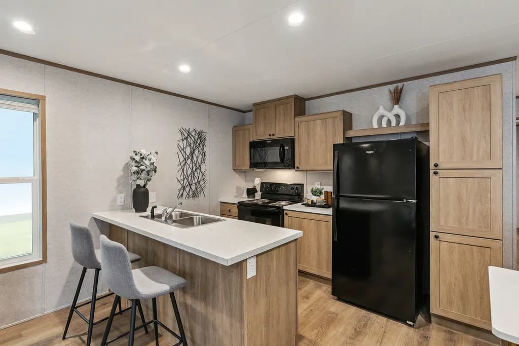 Click to enlarge Vertex Reverse Aisle single wide home — kitchen (photo 4 of 8)