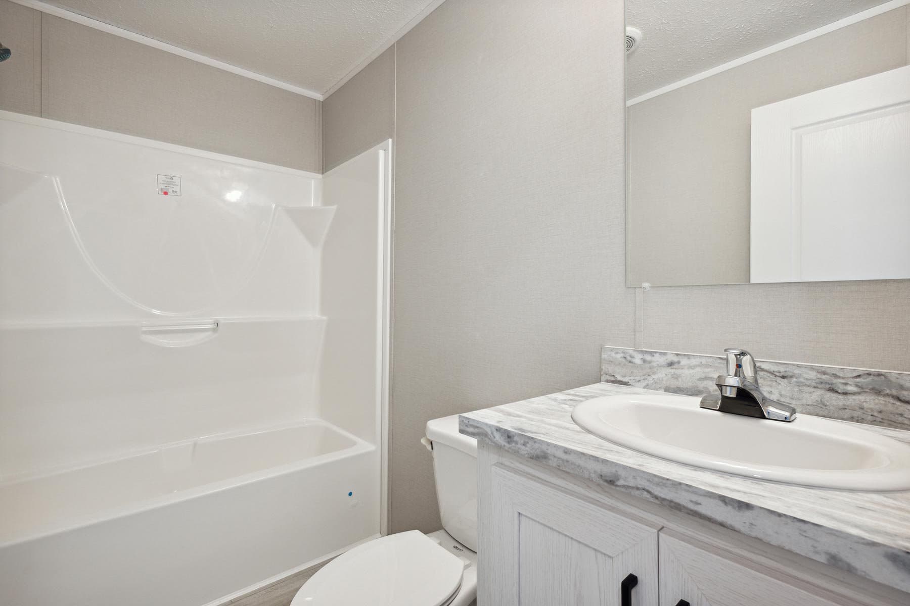 Click to enlarge 1466H32082 single wide home — bathroom (photo 9 of 10)