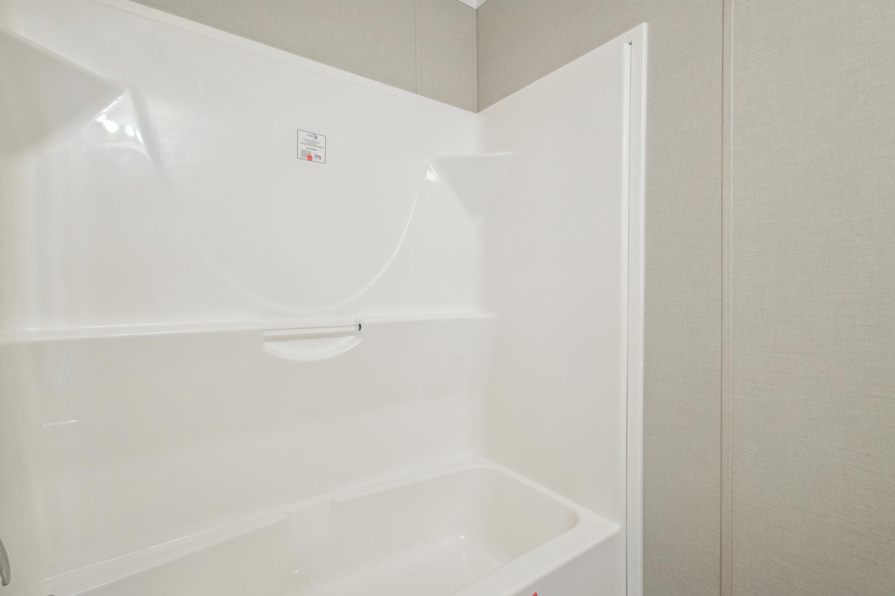 Click to enlarge 1466H32082 single wide home — primary bathroom (photo 7 of 10)