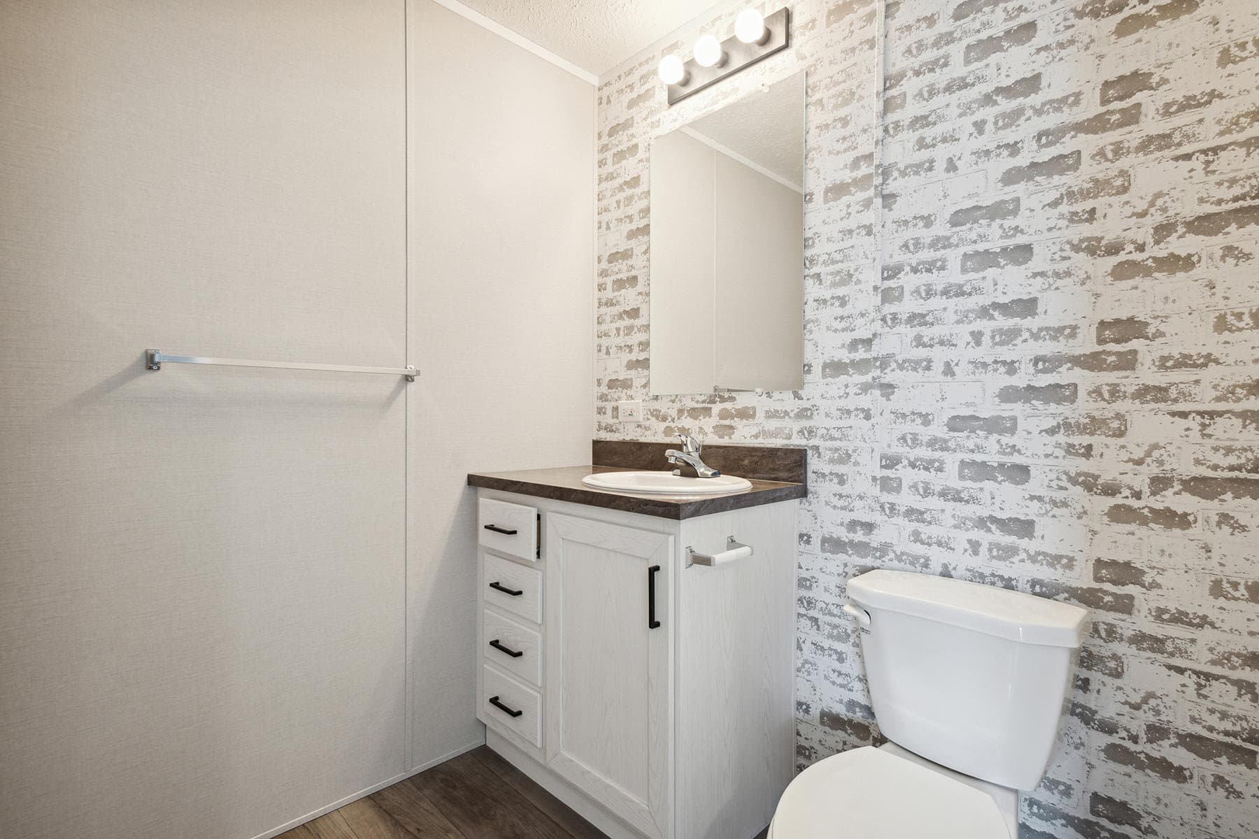 Click to enlarge 1656H22208 single wide home — primary bathroom (photo 5 of 9)