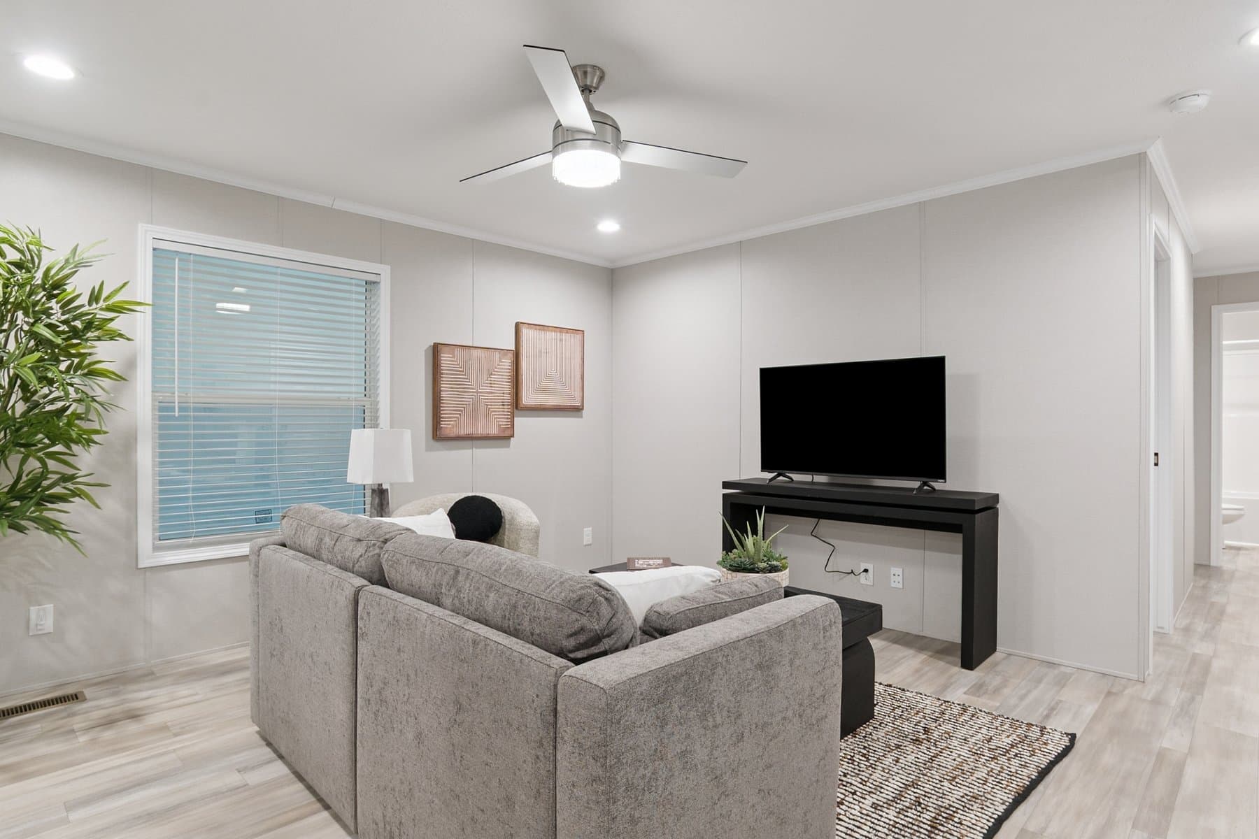 Click to enlarge 1666H32085 single wide home — living room (photo 11 of 29)