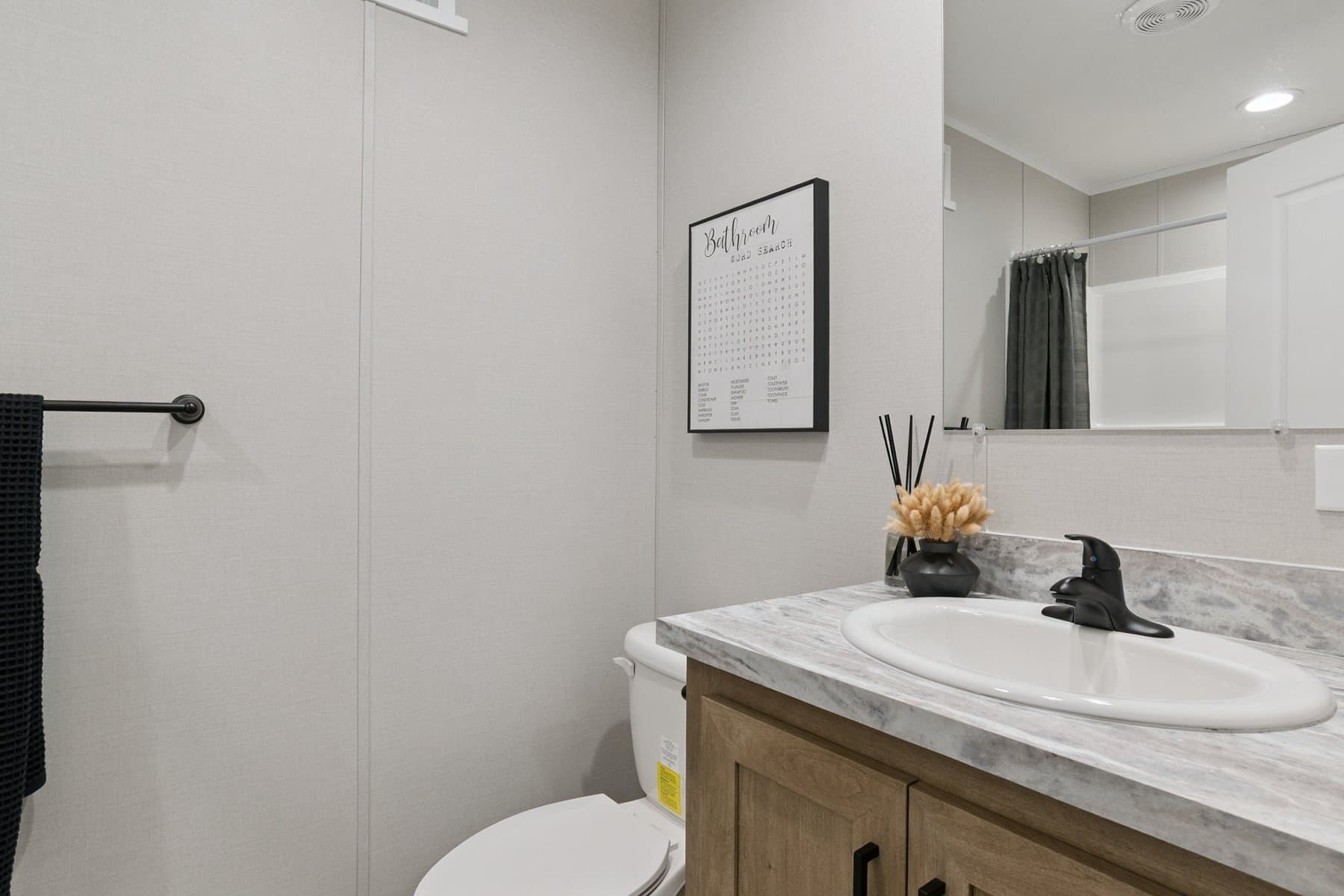 Click to enlarge 1666H32085 single wide home — primary bathroom (photo 22 of 29)