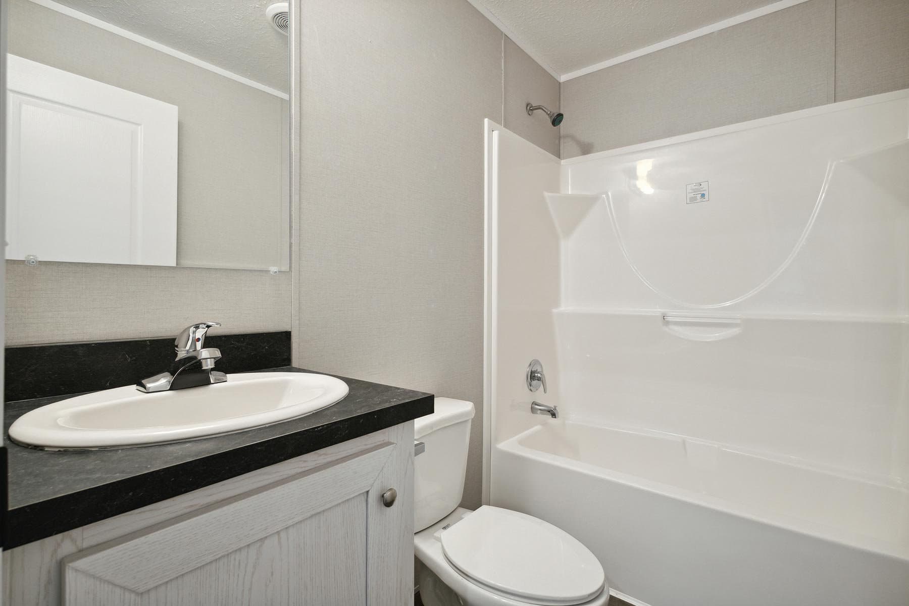 Click to enlarge 1666H32085 single wide home — bathroom (photo 8 of 29)