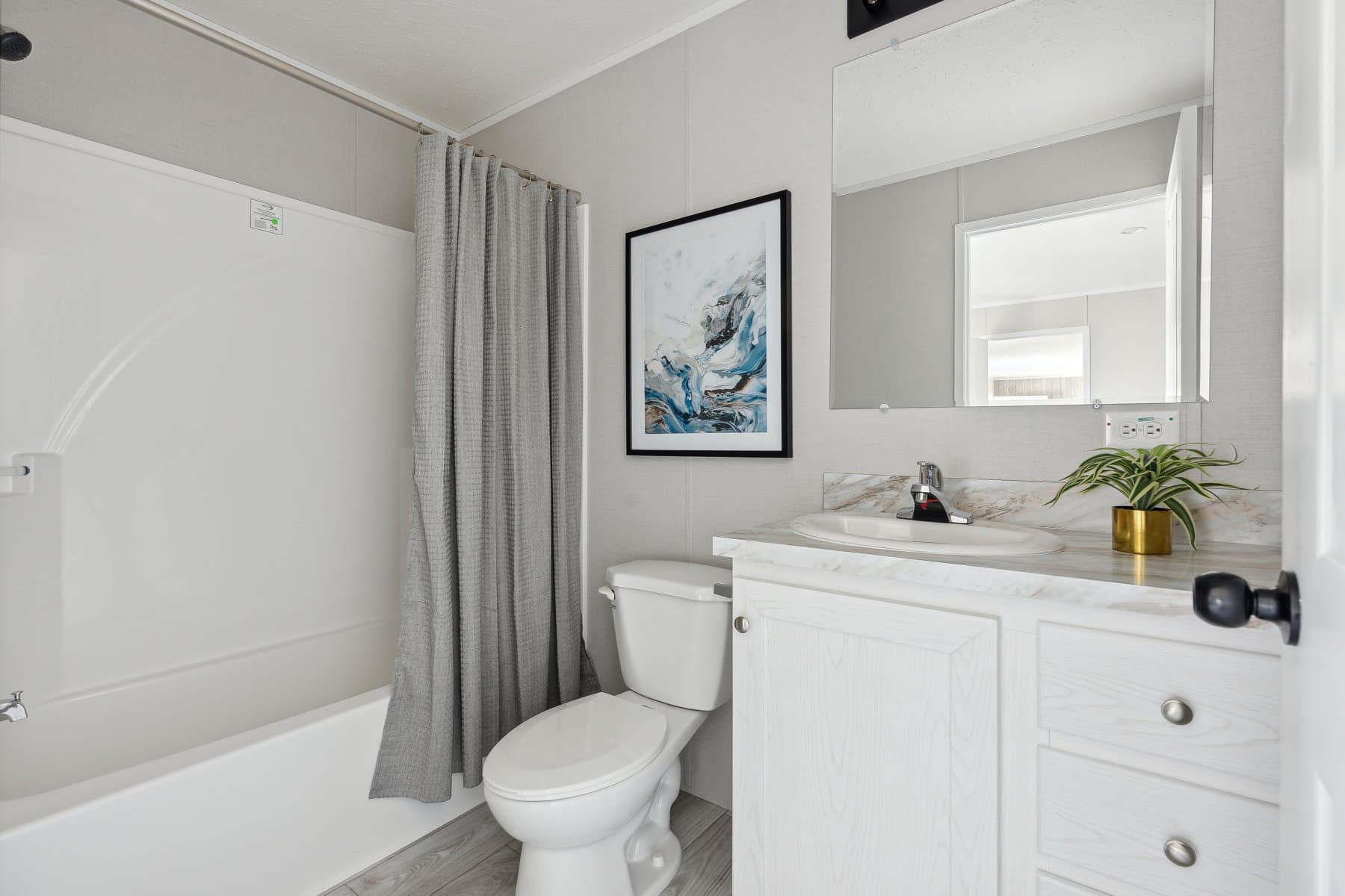 Click to enlarge 1666H32219 single wide home β primary bathroom (photo 4 of 30)
