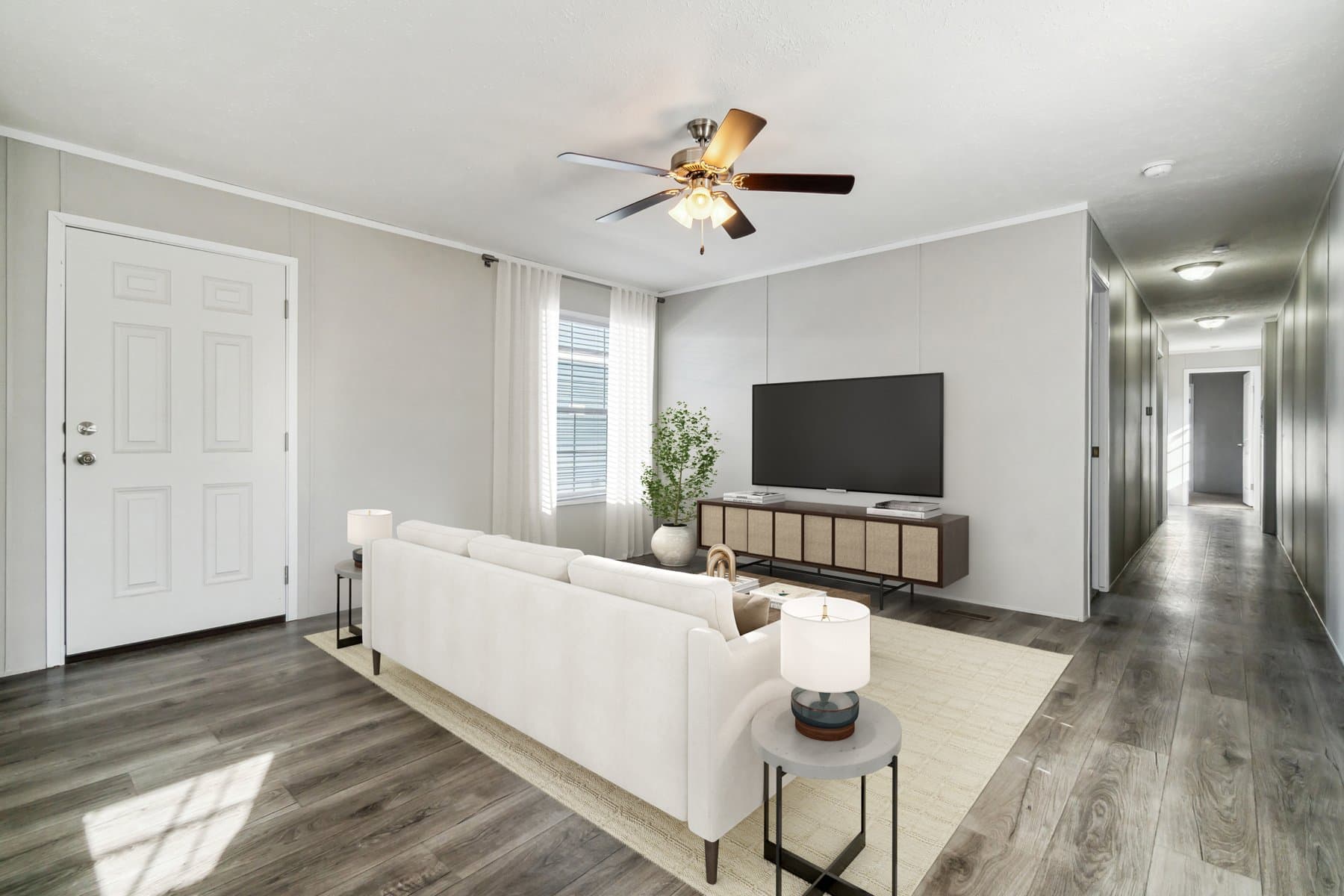 Click to enlarge 1672H32184 single wide home — living room (photo 24 of 40)