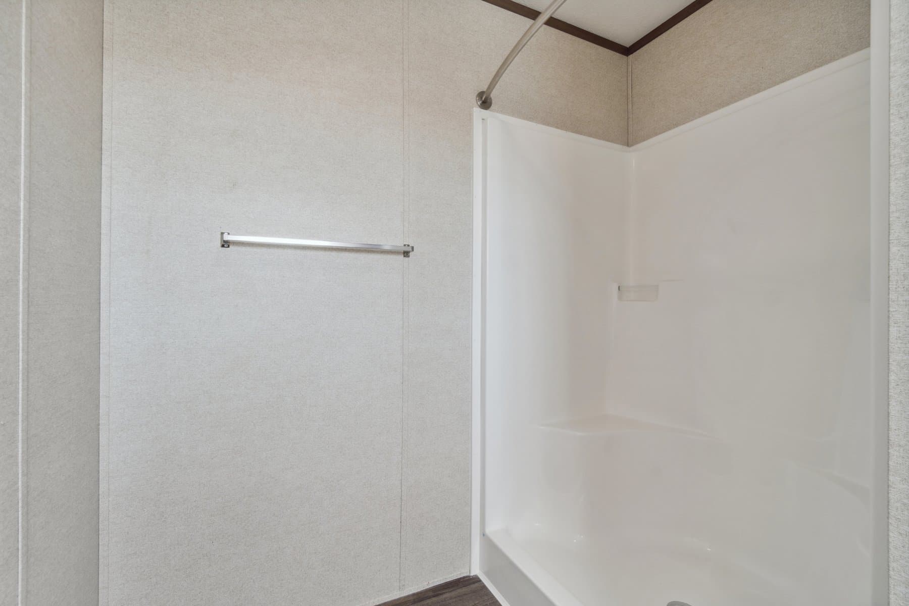 Click to enlarge 1672H32184 single wide home — primary bathroom (photo 15 of 40)