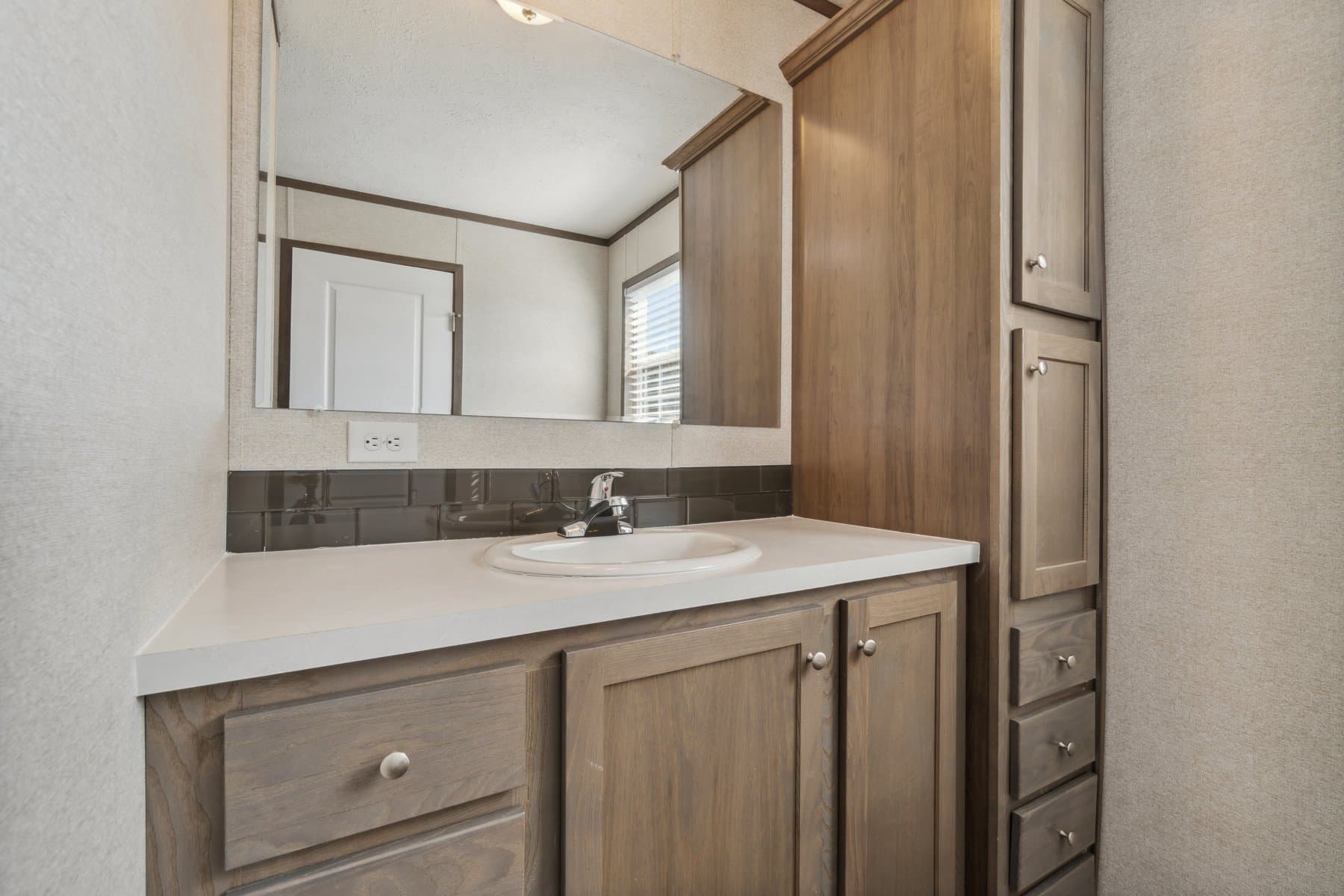 Click to enlarge 1672H32184 single wide home — primary bathroom (photo 14 of 40)