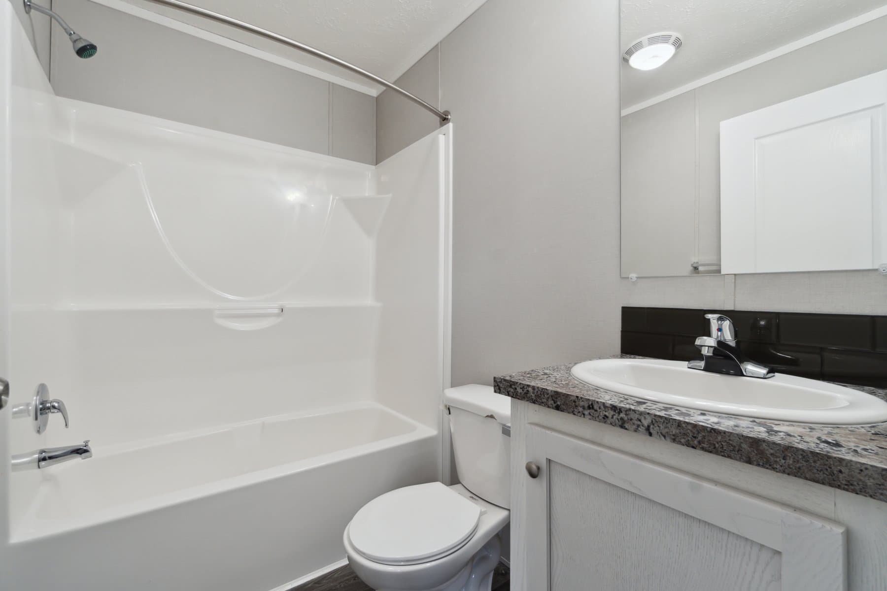 Click to enlarge 1676H32089 single wide home β bathroom (photo 24 of 48)