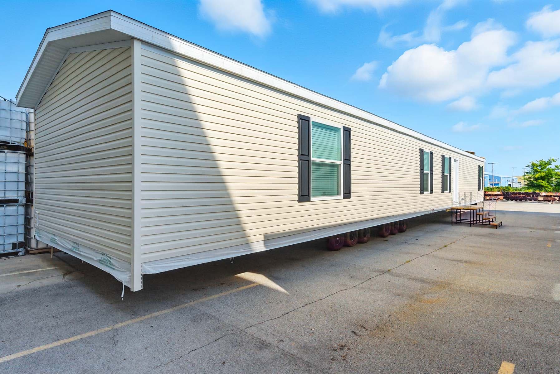 Click to enlarge 1676H32107 single wide home — exterior (photo 10 of 16)