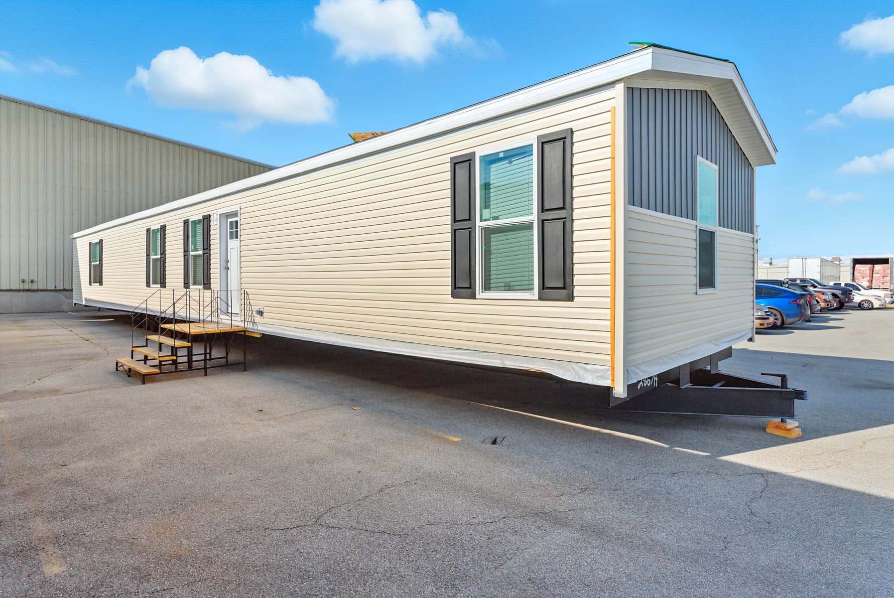 Click to enlarge 1676H32107 single wide home — exterior (photo 11 of 16)