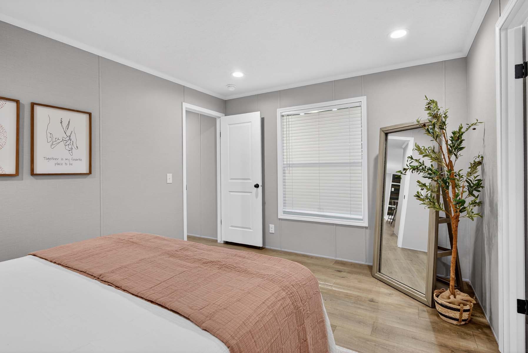 Click to enlarge 1676H32107 single wide home — primary bedroom (photo 15 of 16)
