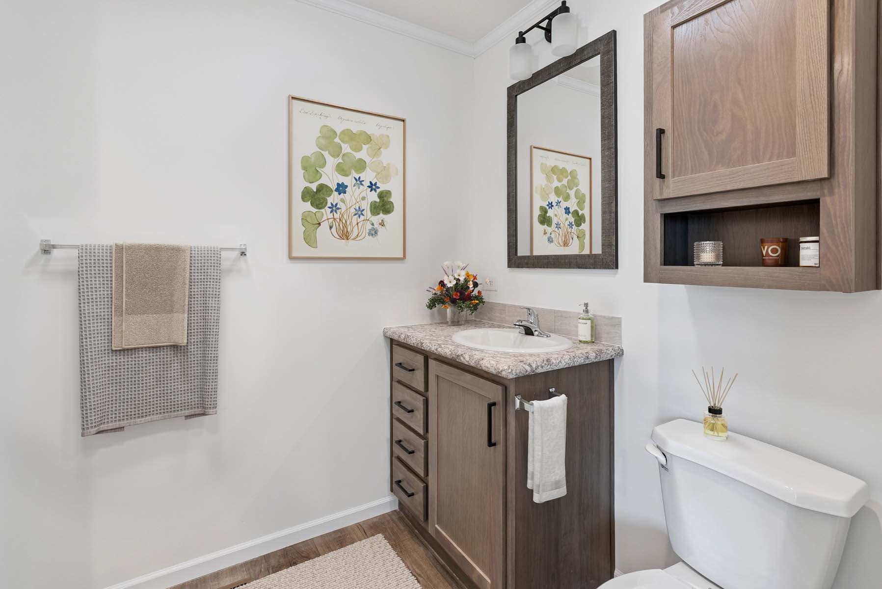 Click to enlarge 1676H32221 single wide home — primary bathroom (photo 13 of 15)