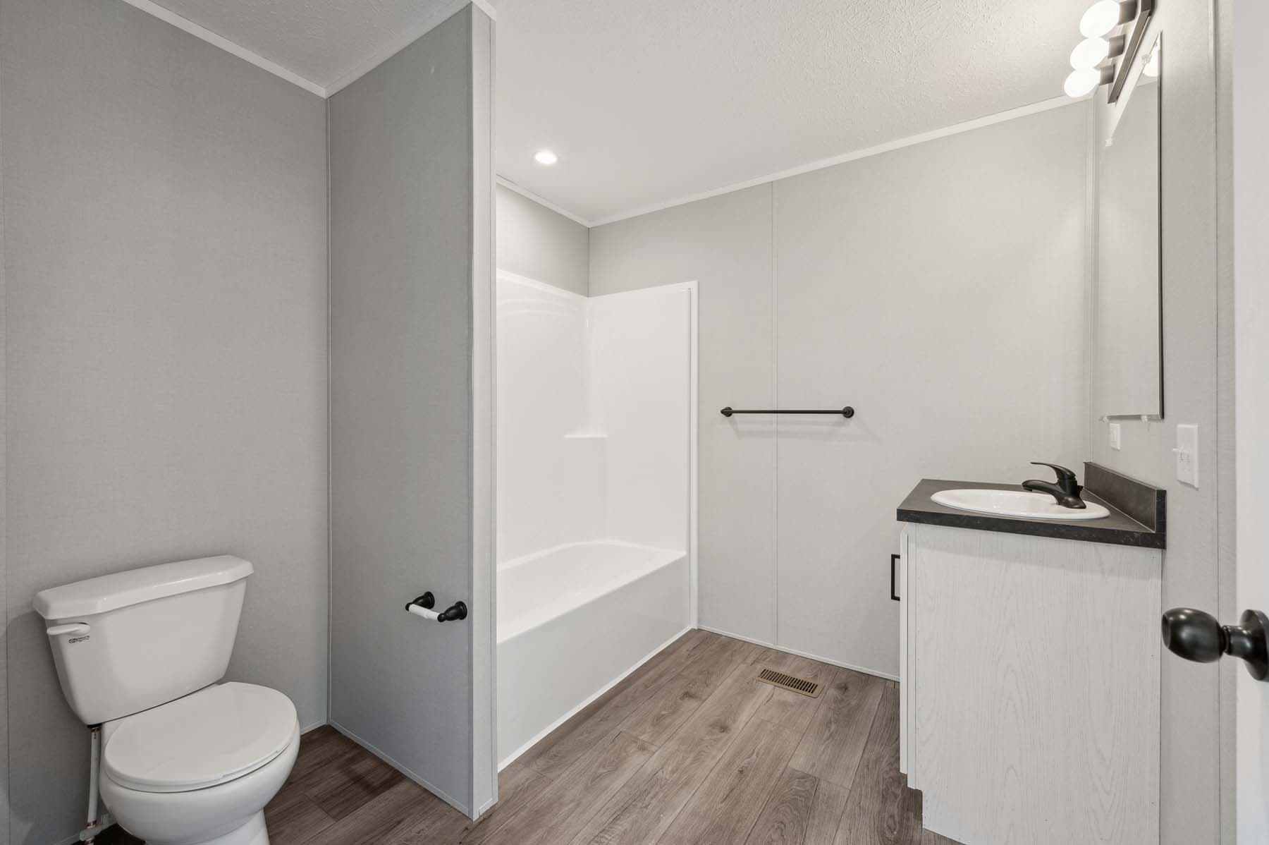 Click to enlarge Lancaster multi-section home β primary bathroom (photo 18 of 18)