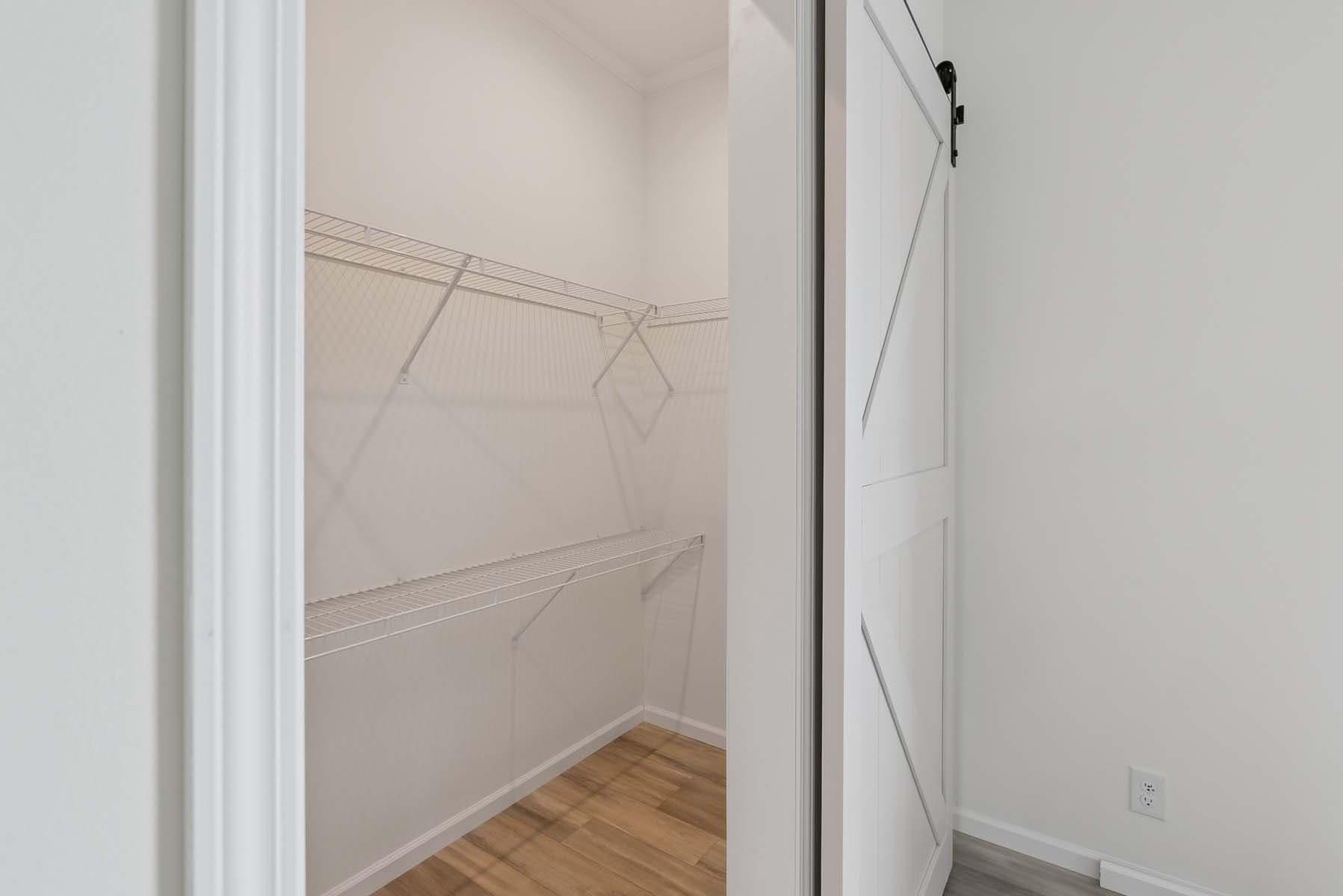 Click to enlarge Belvidere modular home — walk-in closet (photo 27 of 27)