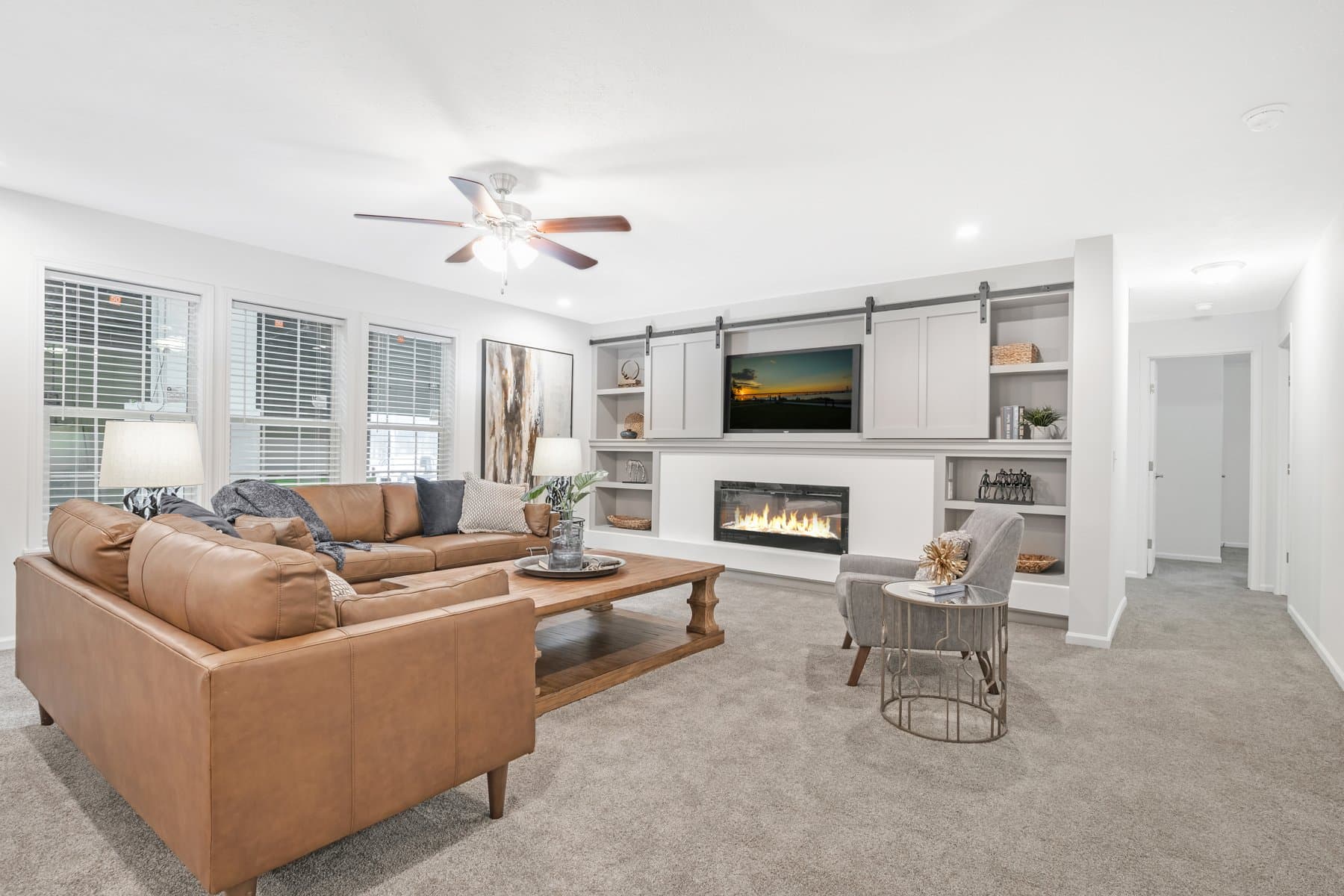 Click to enlarge Winston multi-section home β living room (photo 4 of 9)
