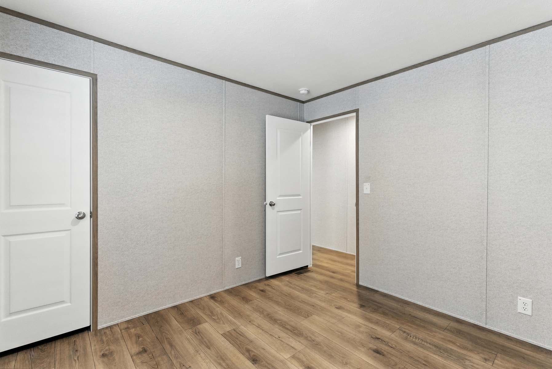 Click to enlarge Monte single wide home — bedroom (photo 10 of 37)
