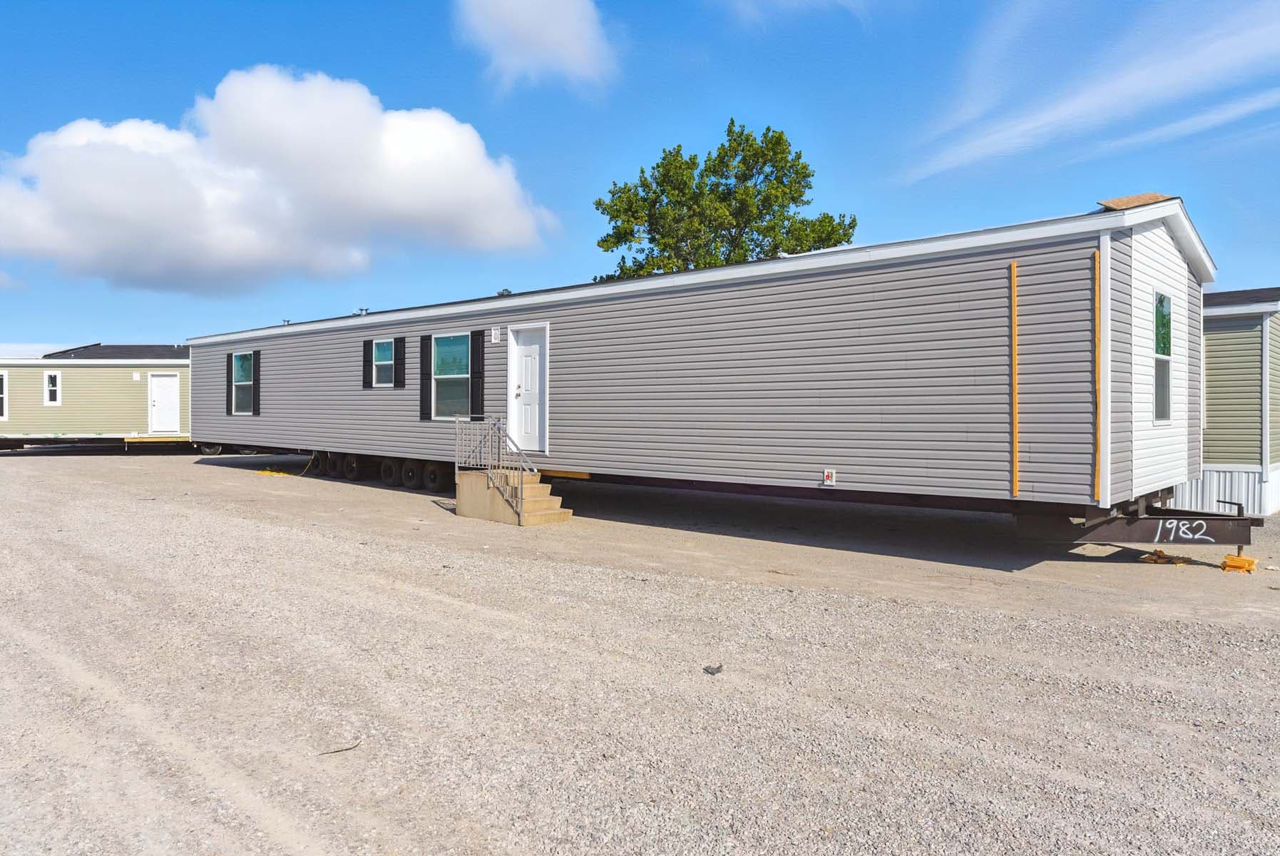 Click to enlarge Monte single wide home — exterior (photo 15 of 37)