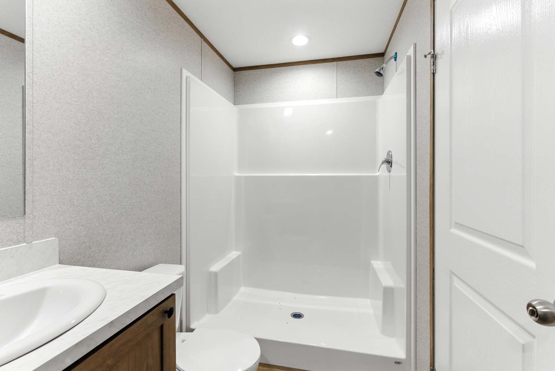 Click to enlarge Monte single wide home — primary bathroom (photo 30 of 37)