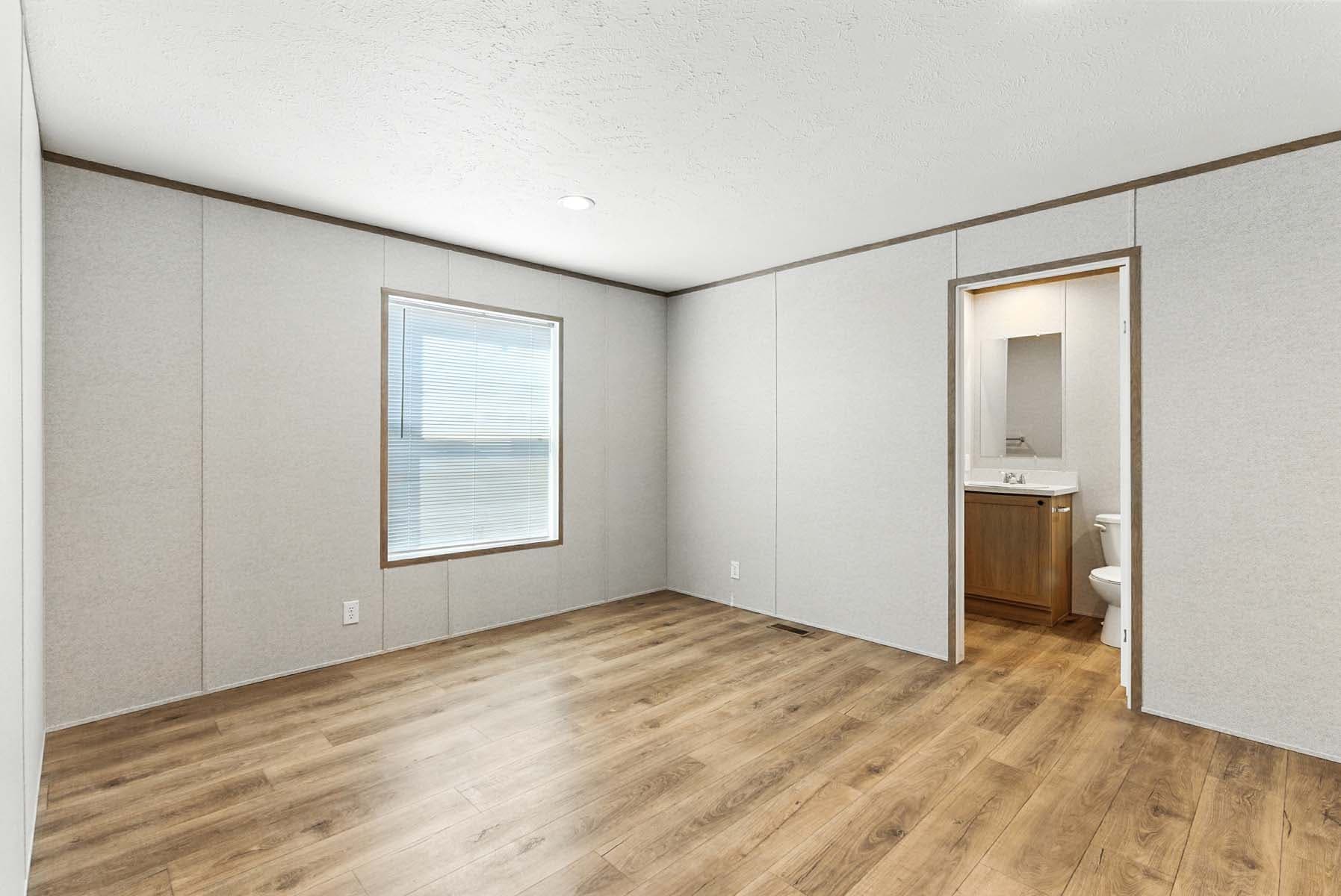 Click to enlarge Monte single wide home — primary bedroom (photo 33 of 37)